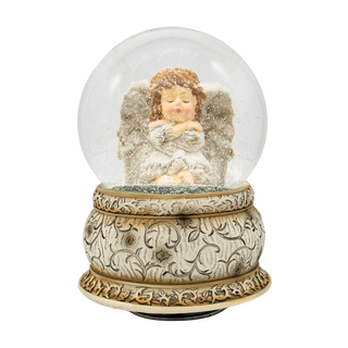 Musical snow globe with an angel figure 