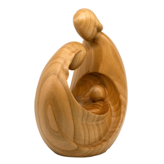 detail of wooden sculpture of the holy family figure