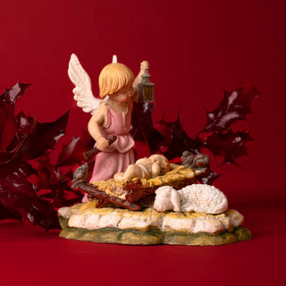 Angel with baby jesus statue