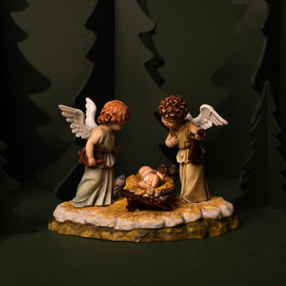 Angels with baby Jesus statue