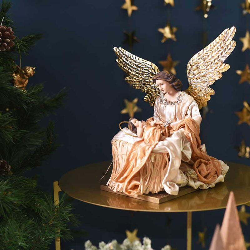 Infant Jesus with angel statue with fabric clothing