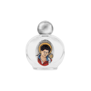 Small glass bottle with a silver cap featuring an image of Carlo Acutis