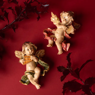 Angel with red and green drap