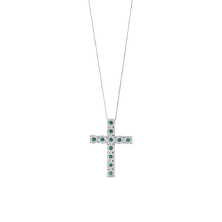 Cross diamond necklace featuring emeralds and diamonds on a delicate chain.