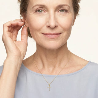 Golden silver cross pendant with zirconia