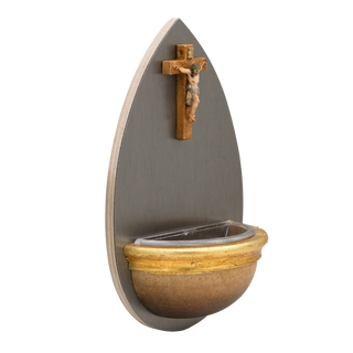 Teardrop-shaped silver-toned metal wall-mounted holy water font with a  crucifix mounted near the top center