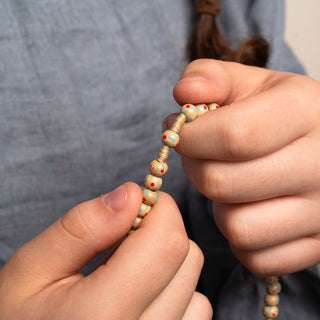 Children's rosary in natural wood