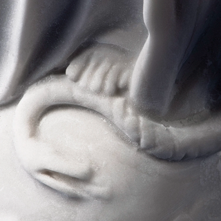 Close-up of a marble Miraculous Madonna statue