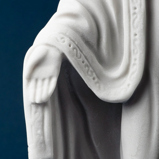 Close-up of a marble Miraculous Madonna statue