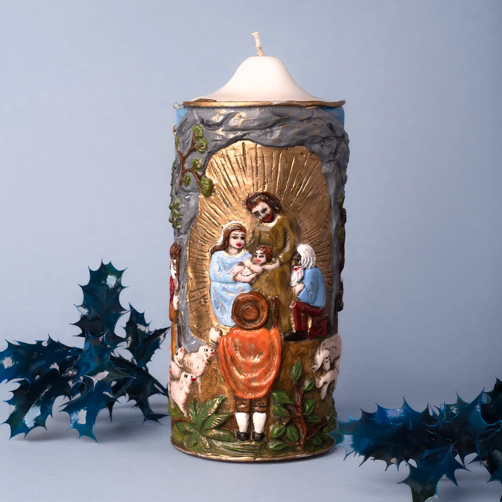 Decorative candle with religious scene 