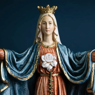 A close-up of Our Lady mediatrix of all graces statue in hand-painted resin