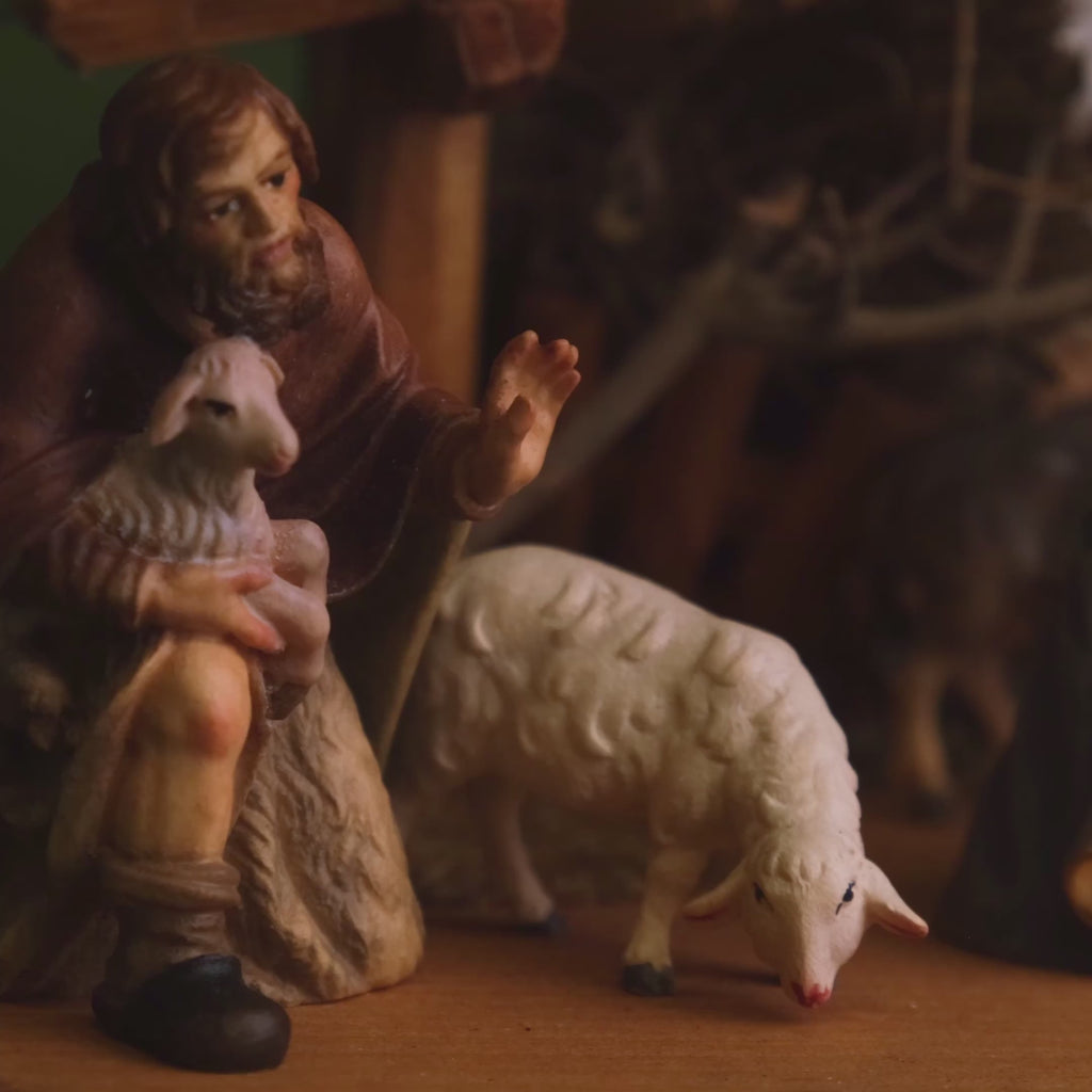 Wooden nativity scene with figures 