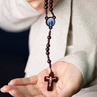 Dark wood rosary with a crucifix pendant 