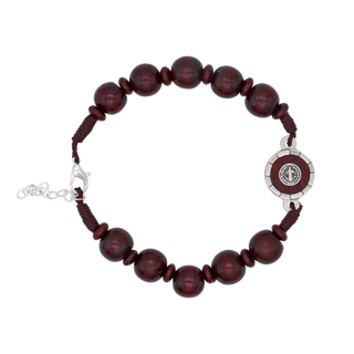 St Benedict Bracelet with dark red beads and silver clasp on a white background