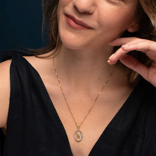 St Mary pendant in gold-plated sterling silver with zirconia, showcasing elegant openwork design.