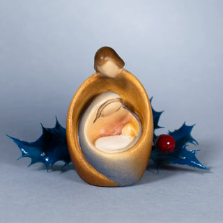 Stylized holy family nativity in wood