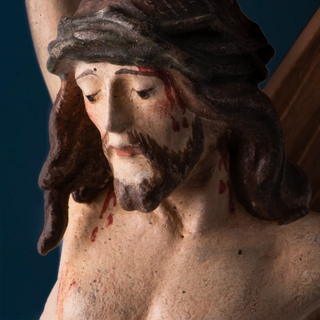 Wall crucifix with blue drap