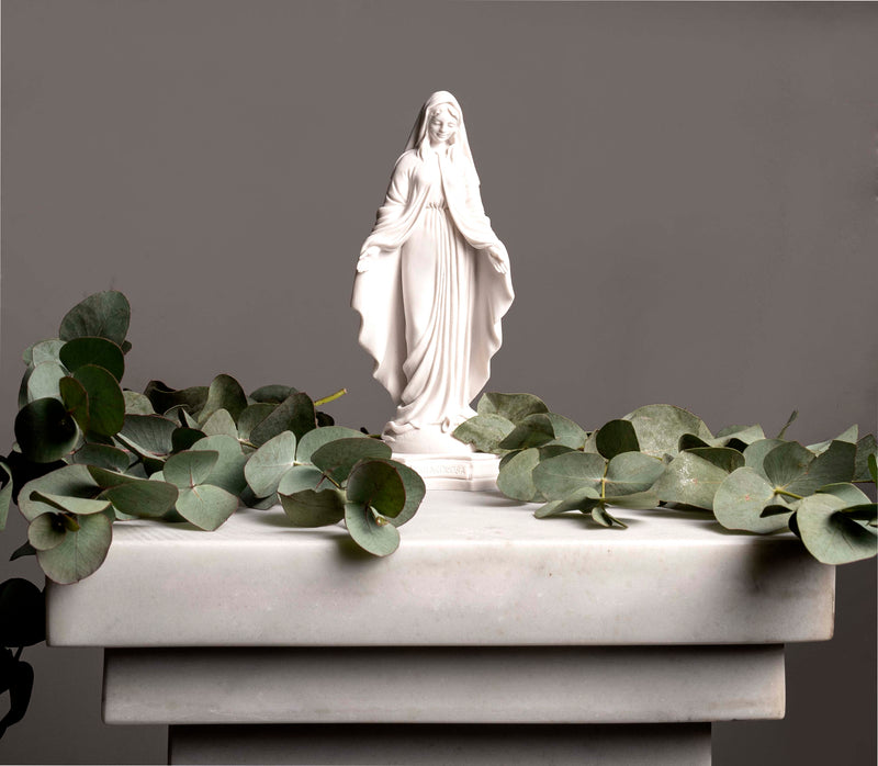 miraculous madonna statue in white marble