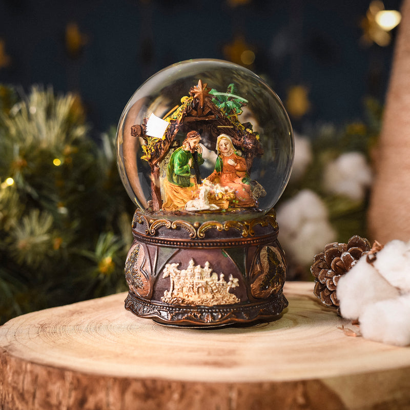 Musical snow globe with Nativity scene inside