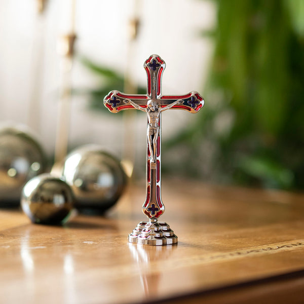 Red metal standing crucifix