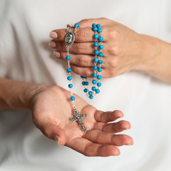 Turquoise rosary bead metal binding