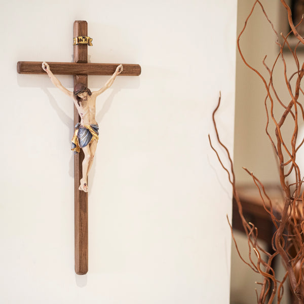 Blue drape wall crucifix in carved wood